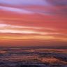 Sunset_on_Frozen_Lake_Marken_The_Netherlands
